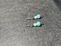 Blue and white imitation pearl dangle earrings