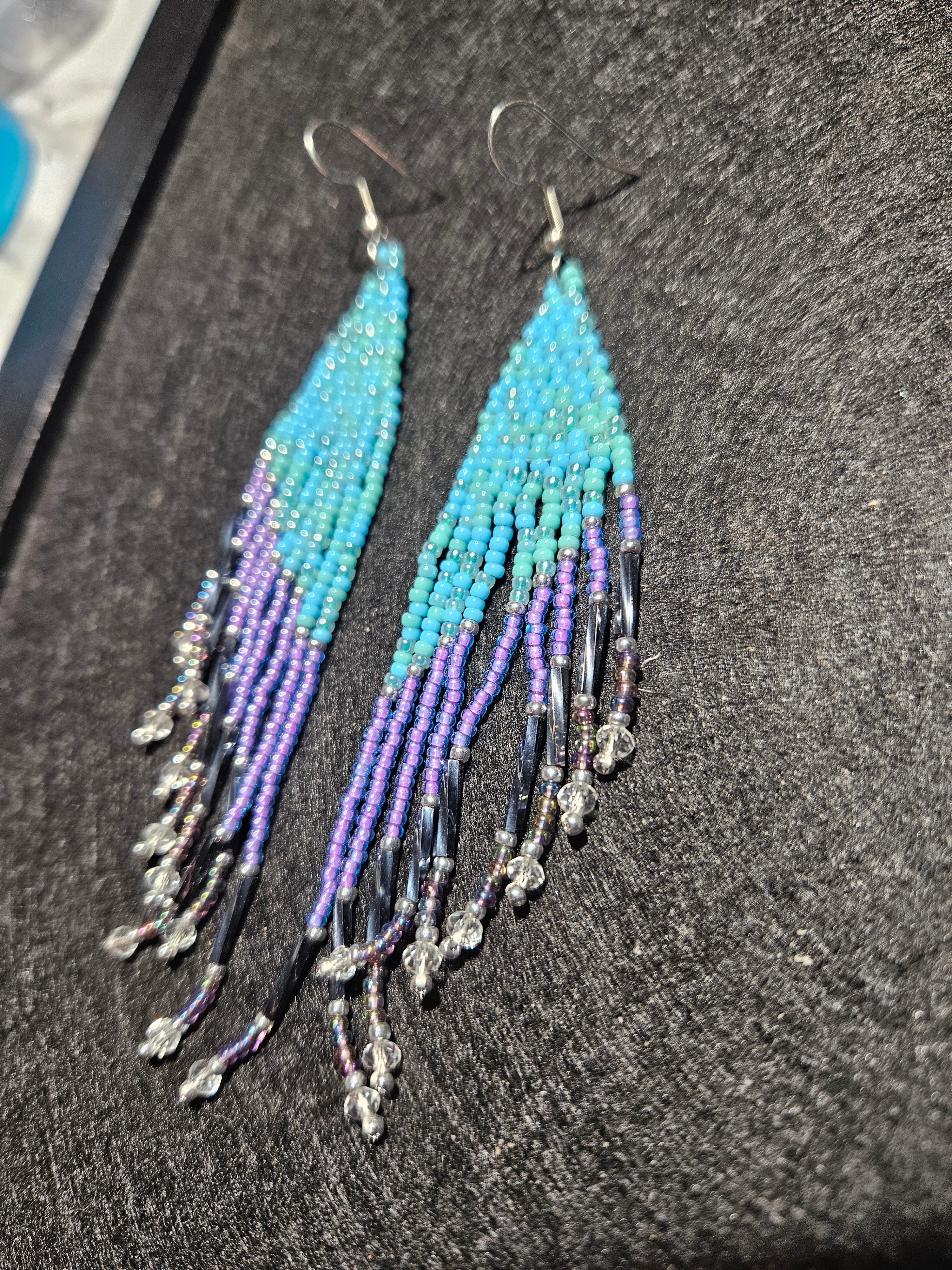 Blue and purple winged fringe earrings