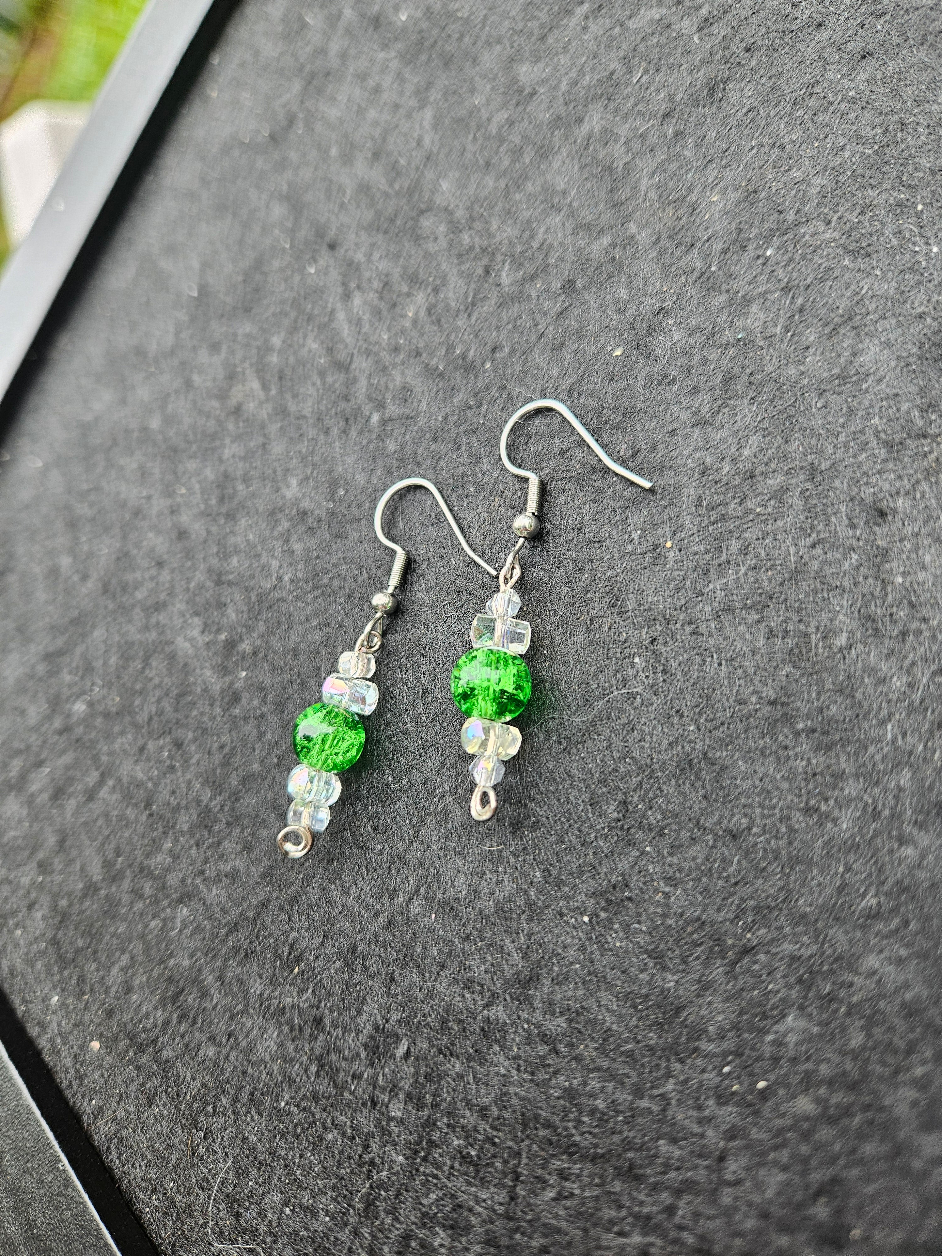 Green dangle earring