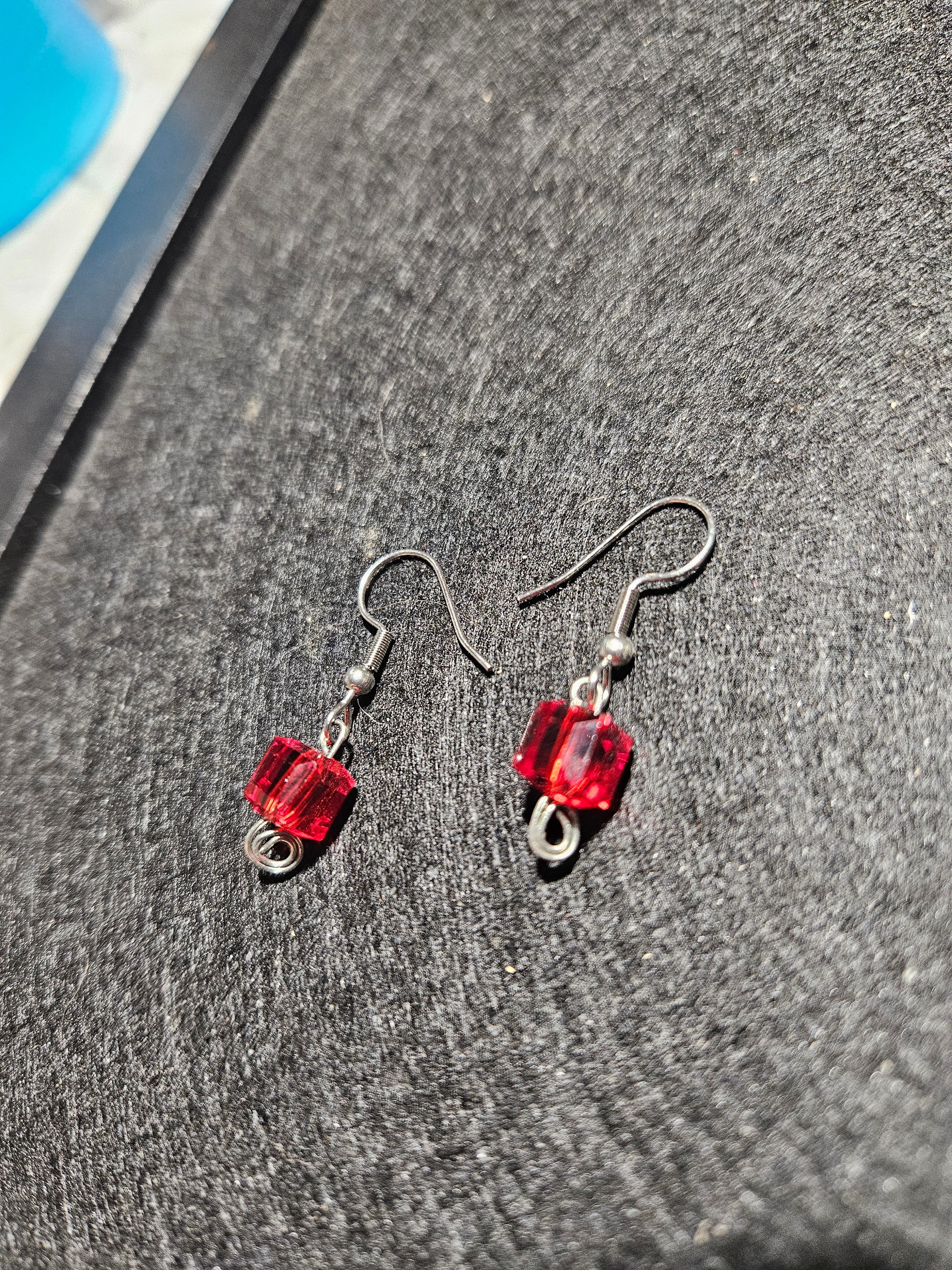 Red dangle earrings