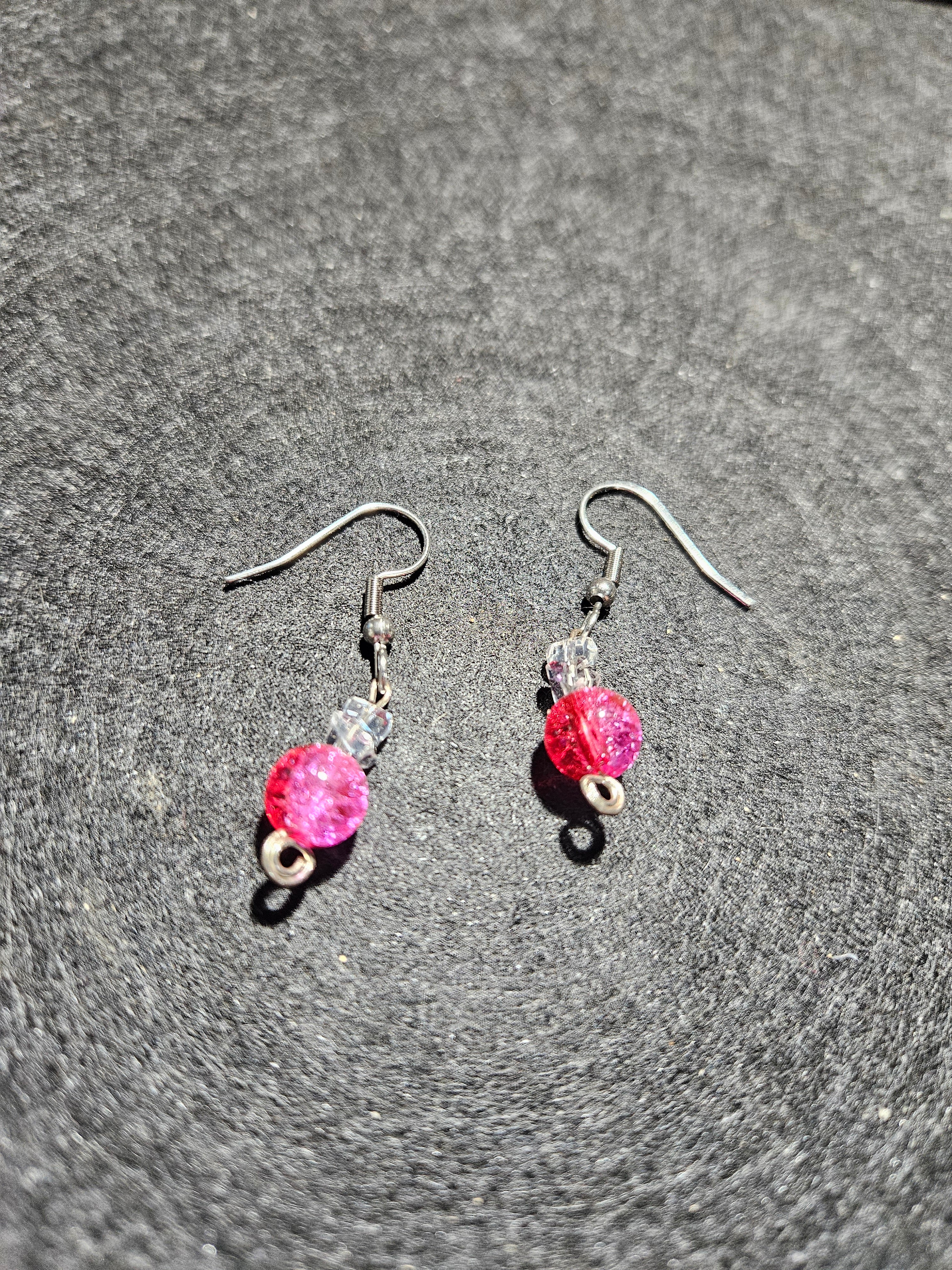 Red and pink dangle earrings