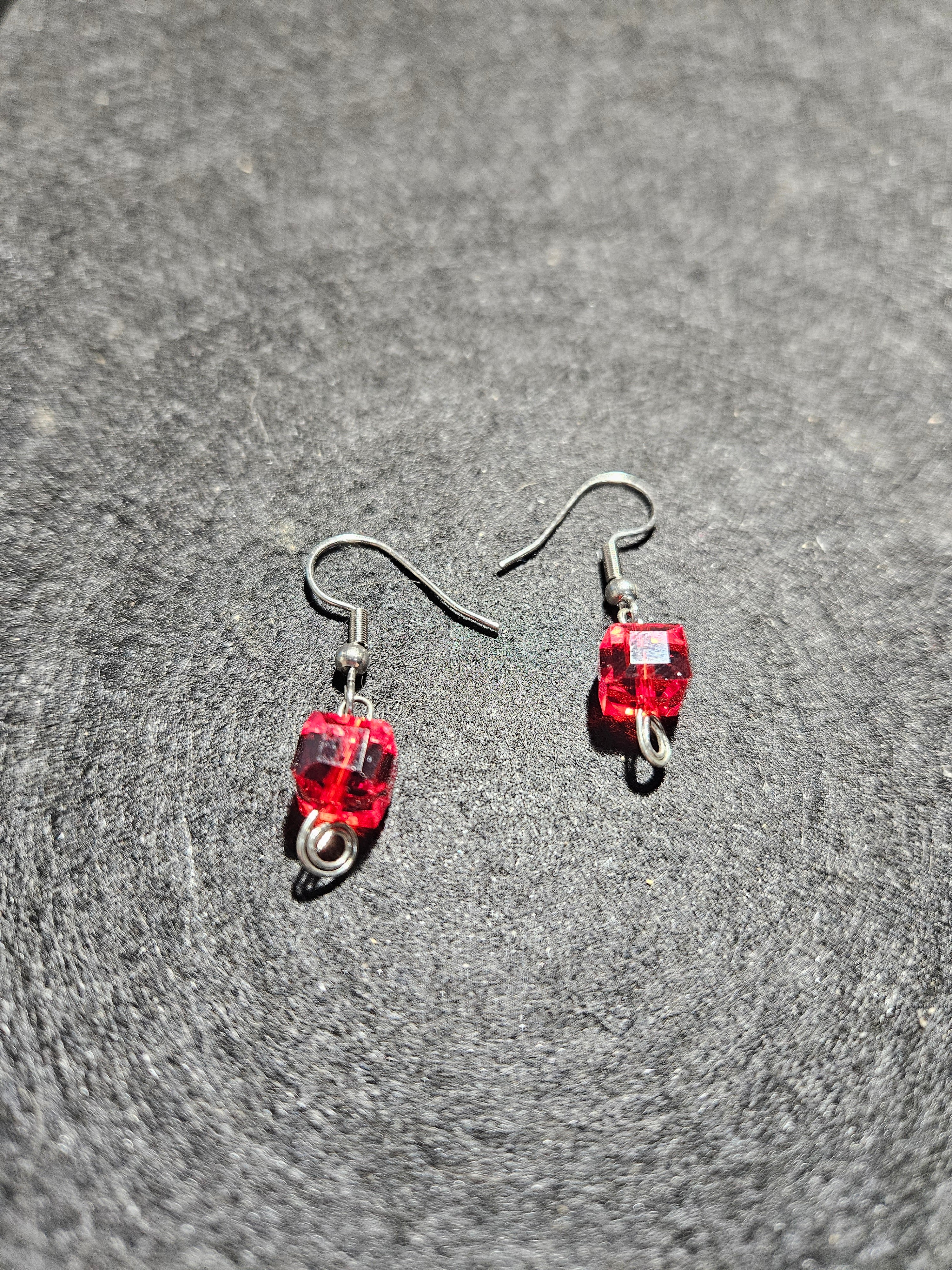 Red dangle earrings