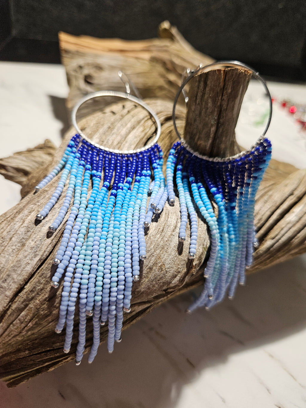 Flying free blue fringe earrings