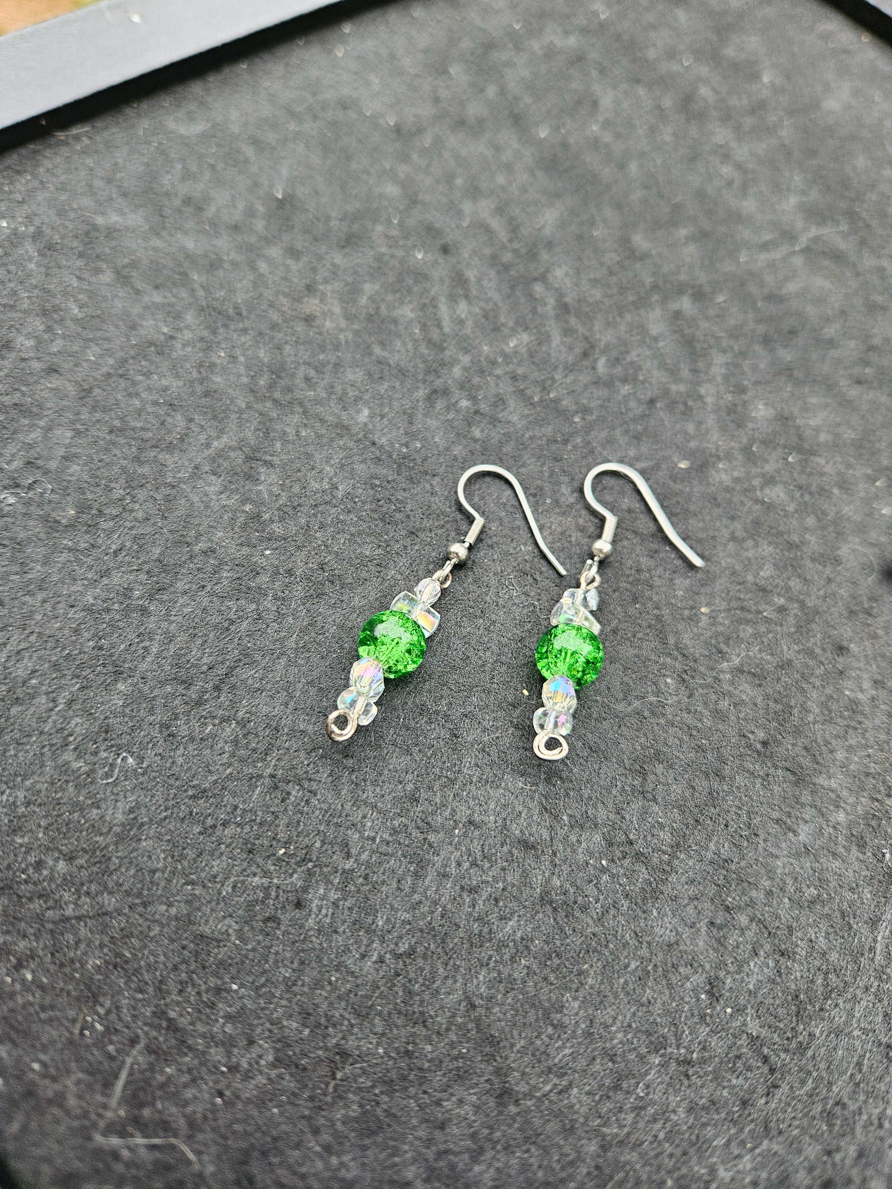 Green dangle earring