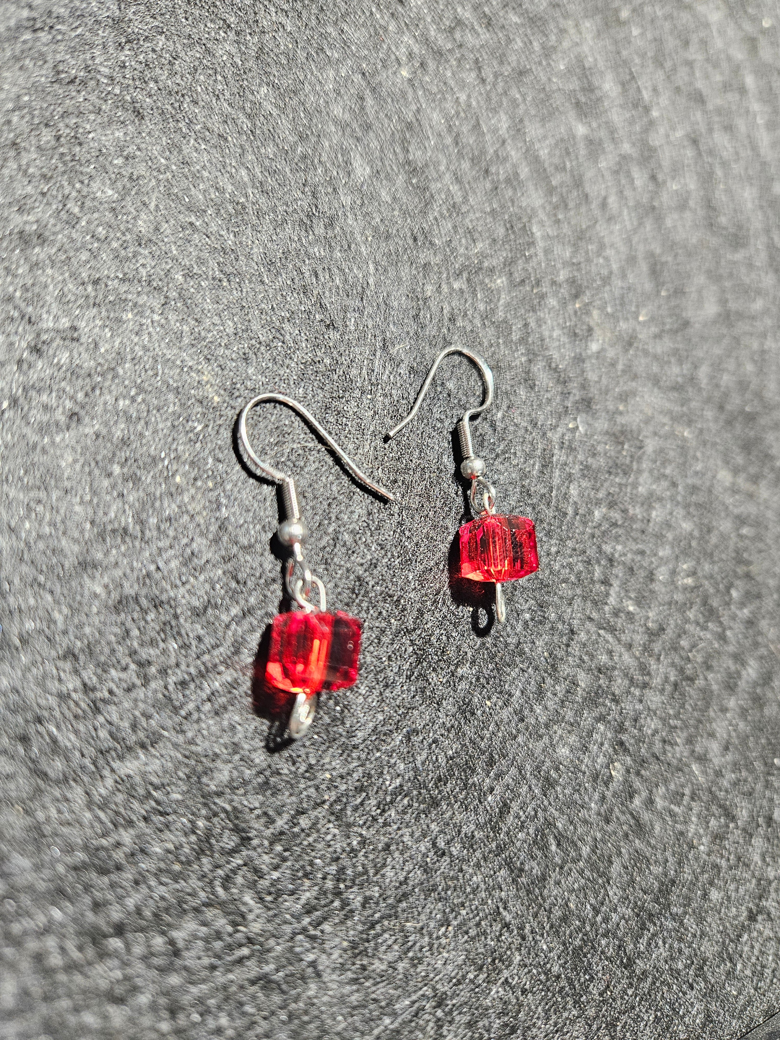 Red dangle earrings