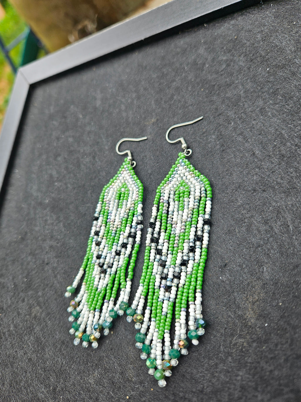 Green fringe earrings