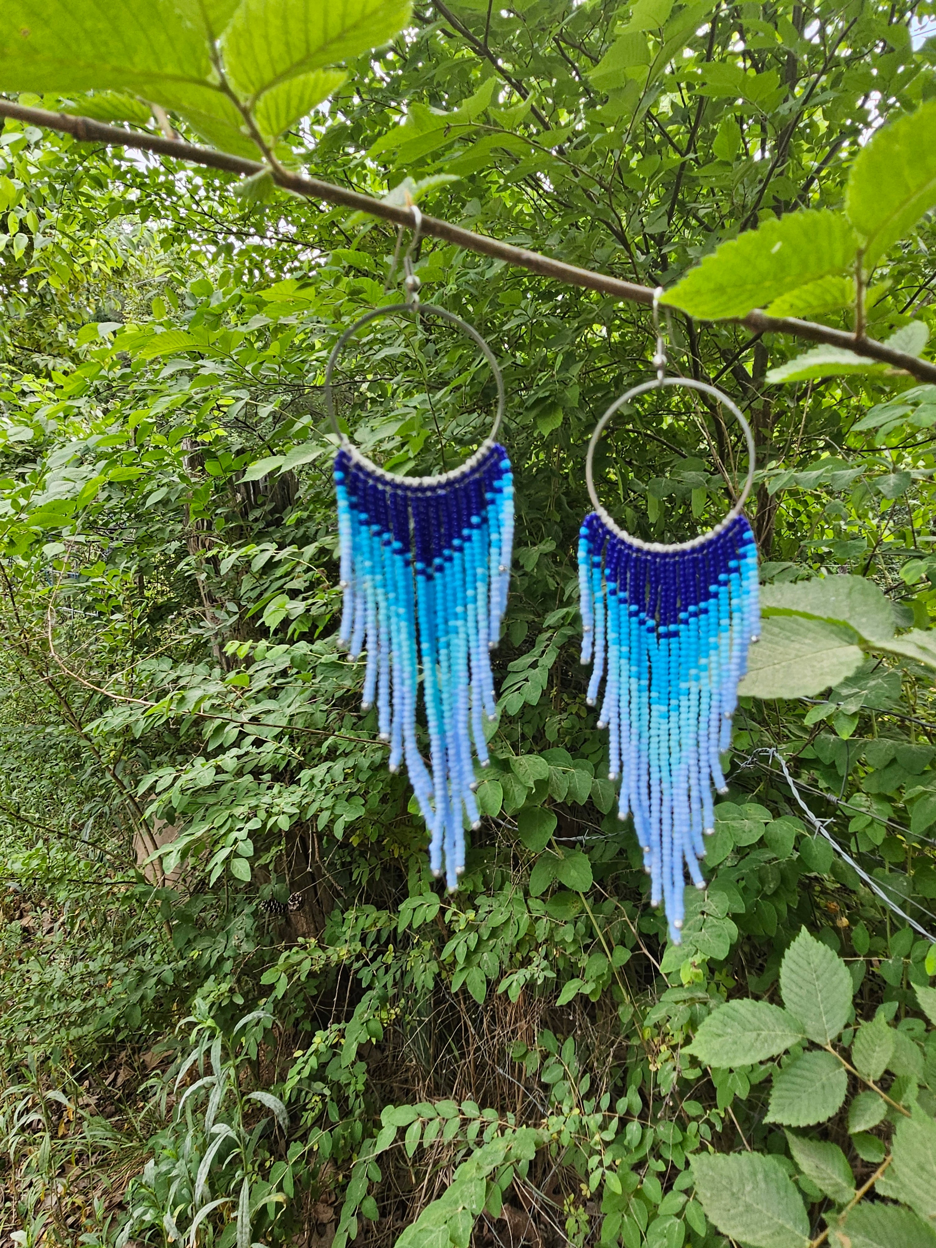 Flying free blue fringe earrings