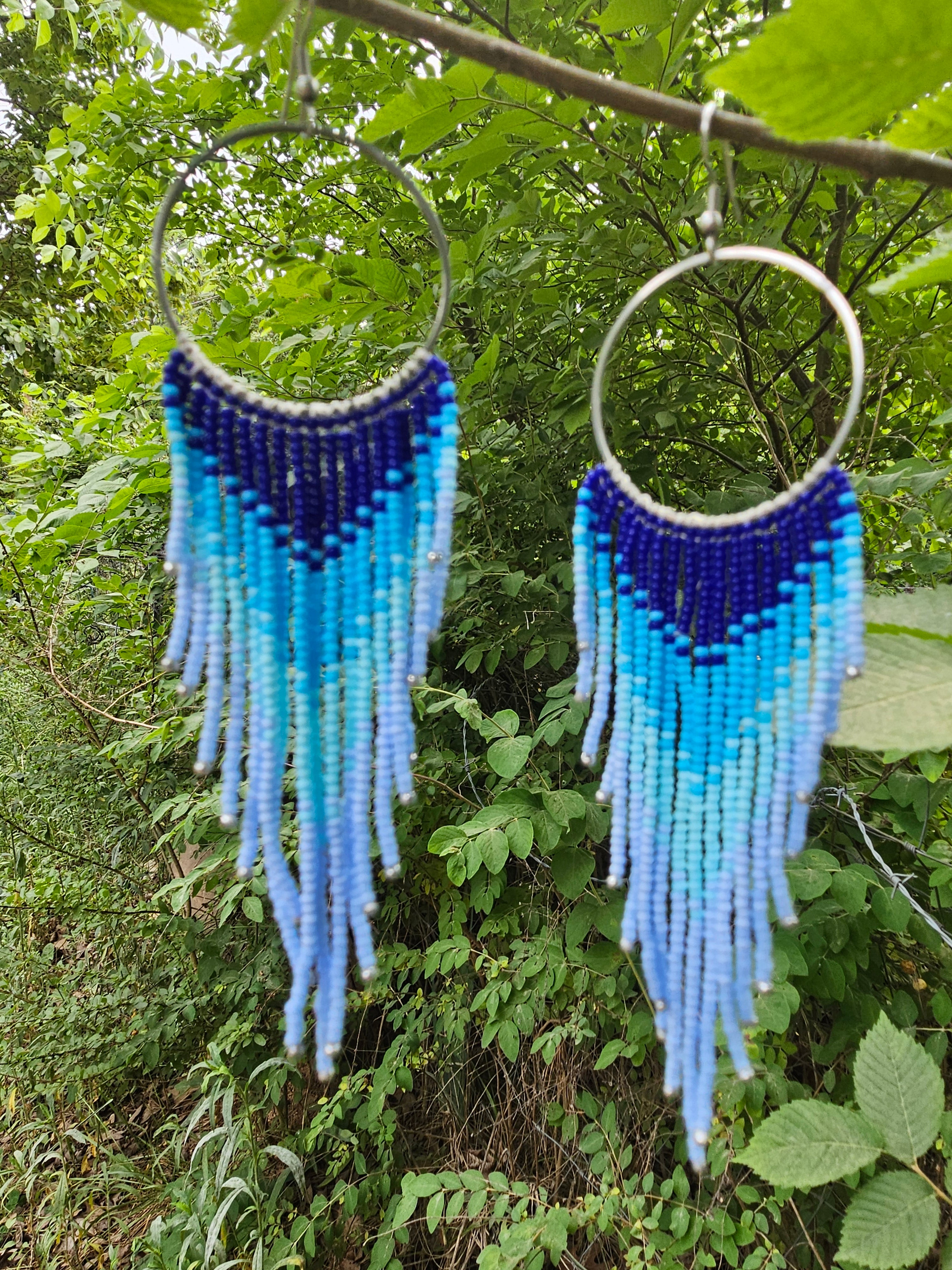 Flying free blue fringe earrings