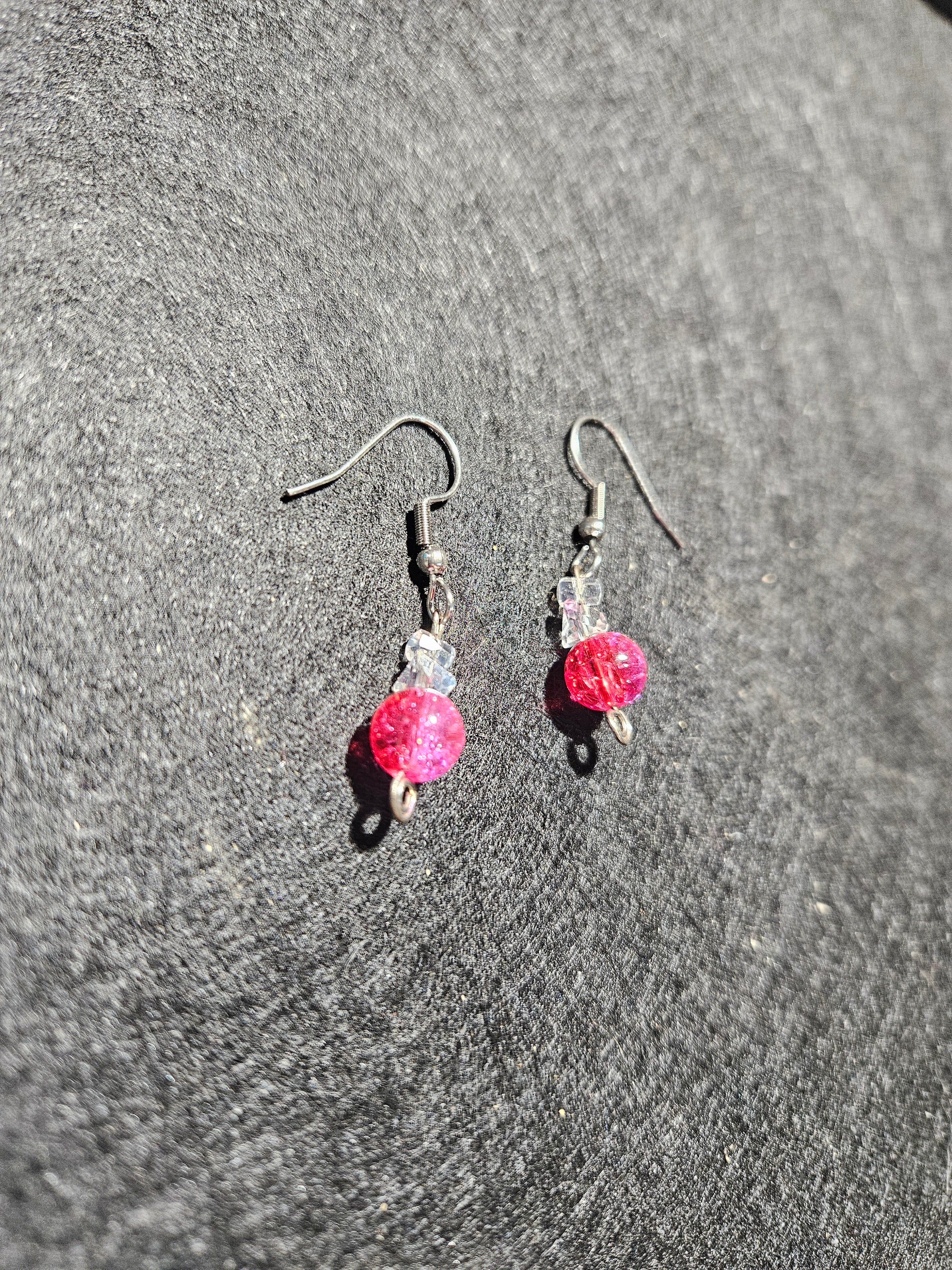 Red and pink dangle earrings