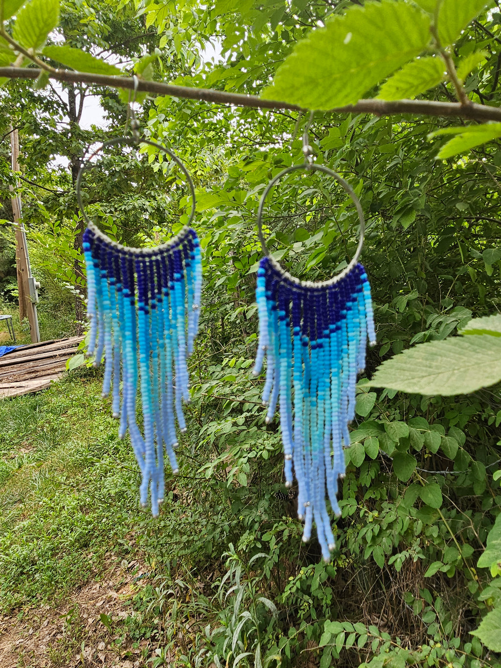 Flying free blue fringe earrings